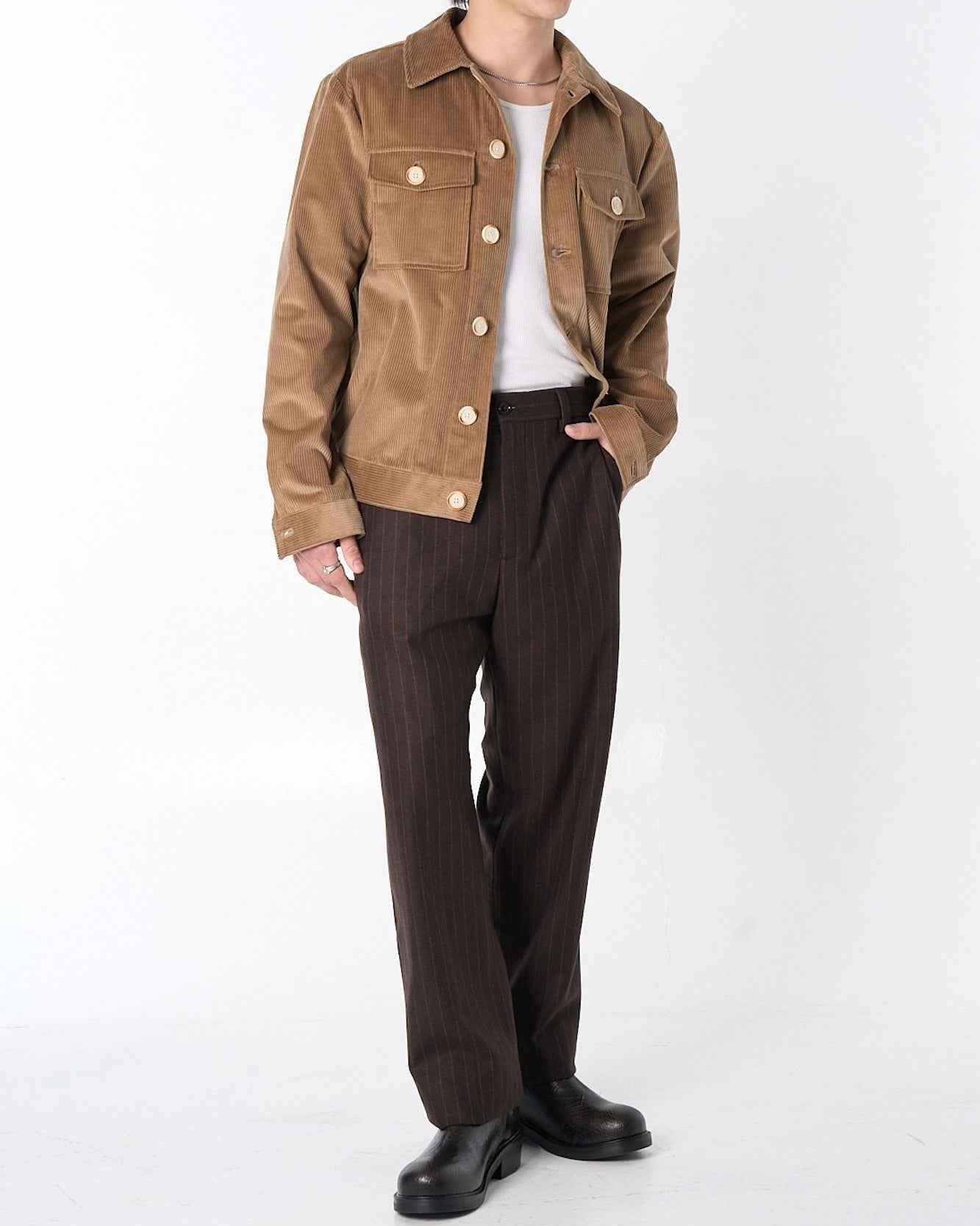 Dean Jacket in fawn brown 8-wale corduroy with relaxed boxy fit, shown on model in full-length view.