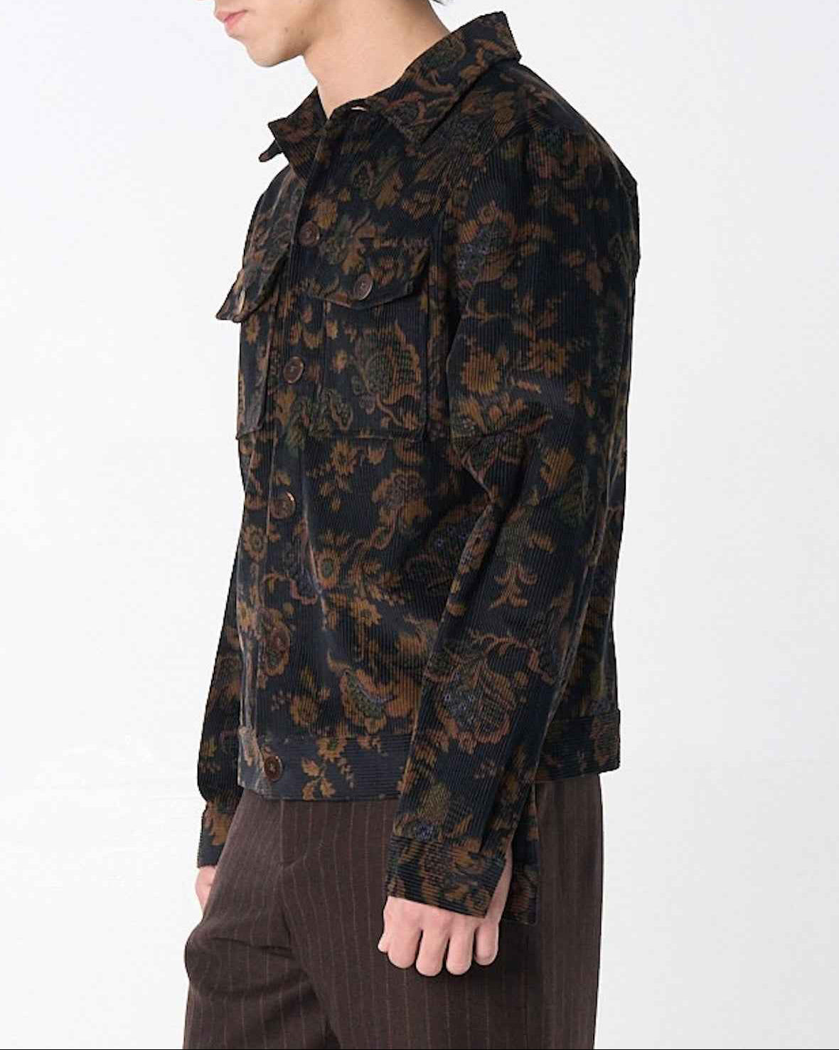 Dean Jacket in black and brown calico floral corduroy with relaxed boxy fit, shown on model against neutral background.