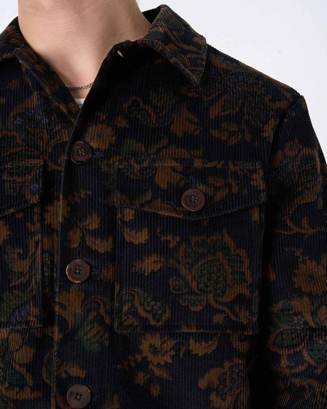 Dean Jacket in black and brown calico floral corduroy, relaxed boxy fit, shown on model from front.