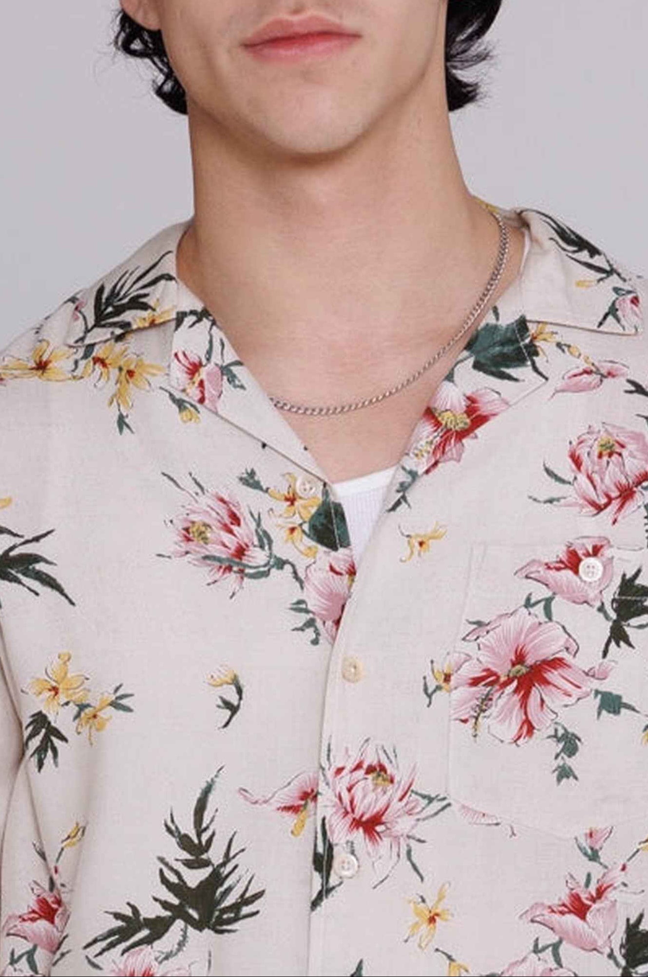 Reinaldo convertible-collar shirt in natural rayon with red ukiyoe hibiscus print, shown on model in relaxed contemporary fit.