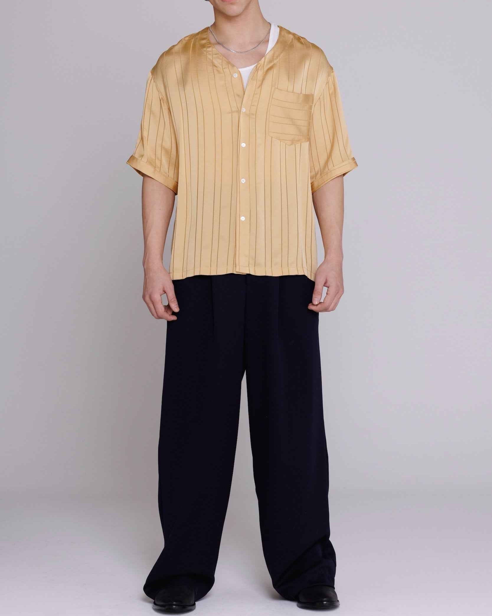 Valenzuela baseball collar shirt in gold satin stripe cupro blend, relaxed fit, shown on model in three-quarter view