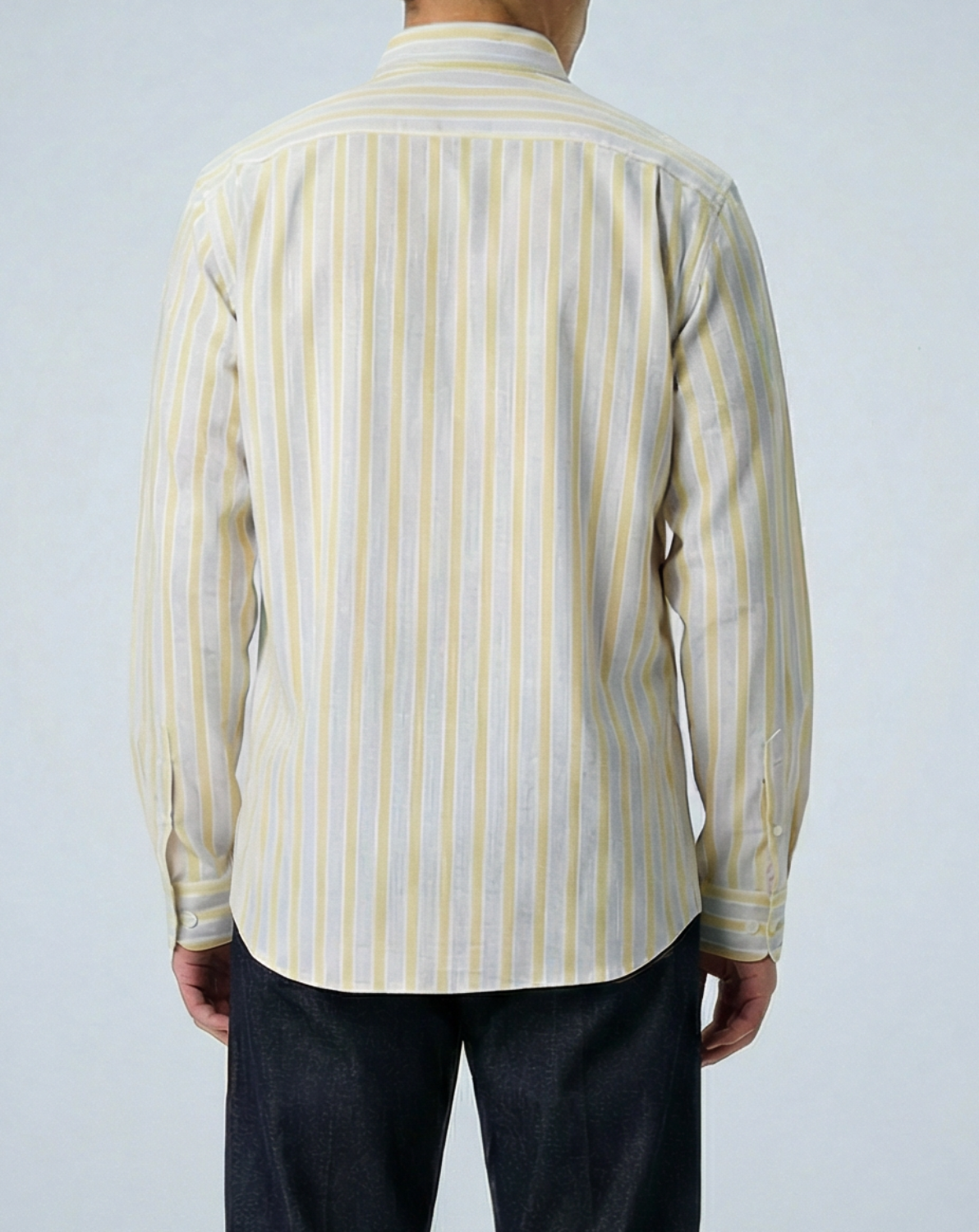 Liam cream and yellow striped long sleeve shirt with band collar, displayed on model showing relaxed fit and textured cotton slub fabric.