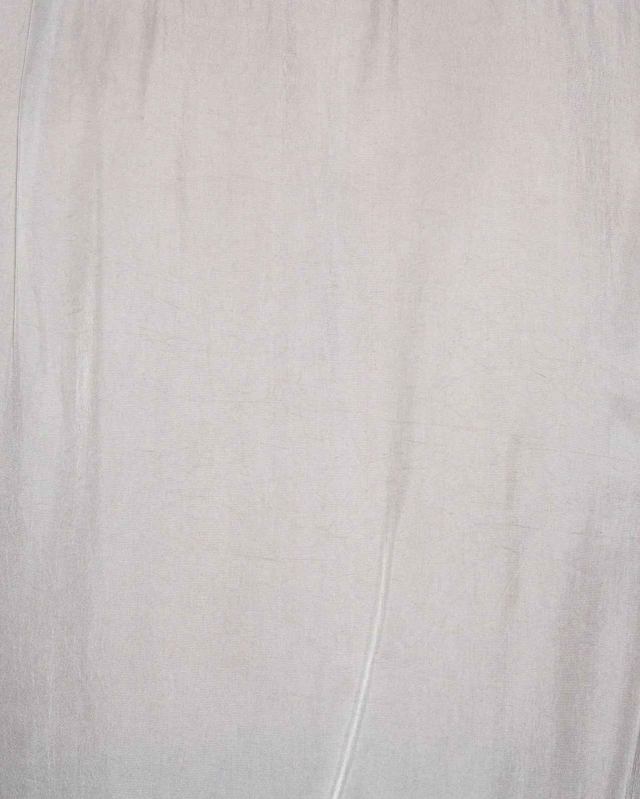 Liam band collar shirt in oyster taupe cupro twill, relaxed fit, long sleeves with button cuffs, worn untucked on model.