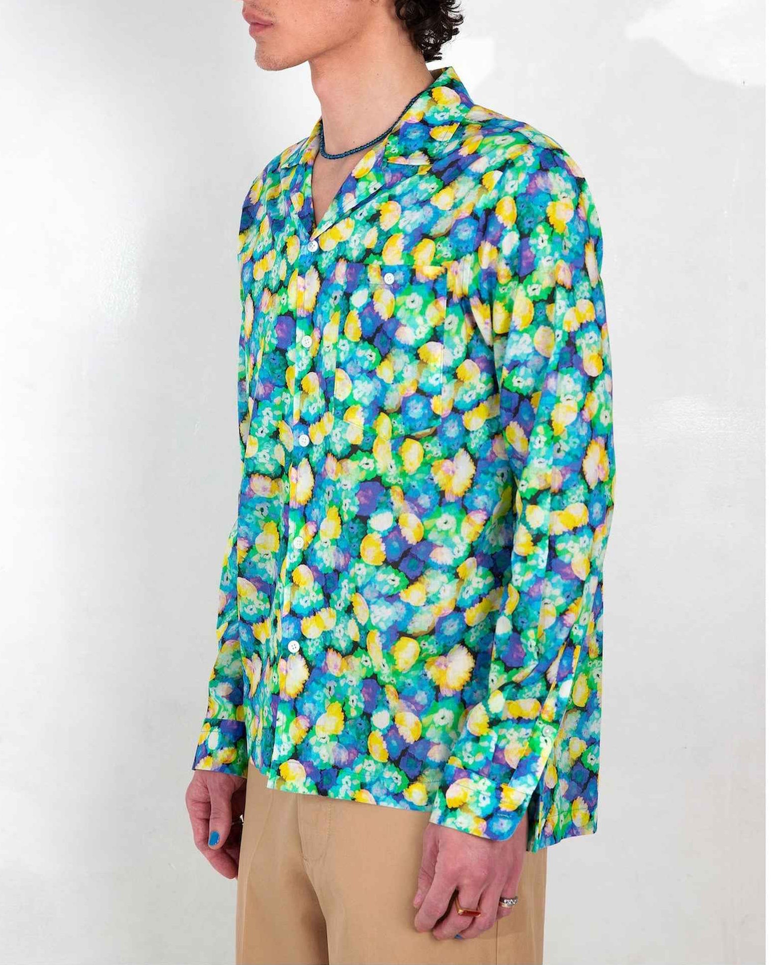 Arenas camp collar shirt in blue floral dream print, relaxed fit, worn untucked on model in three-quarter view