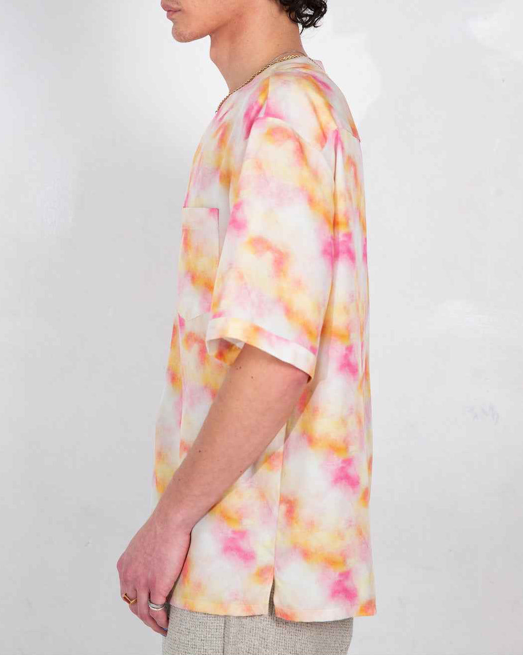 Valenzuela red dream pop print baseball collar shirt on model, relaxed boxy fit with side slits, soft Tencel fabric