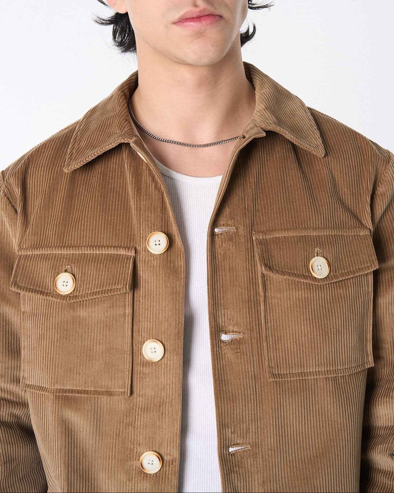 Dean" Jacket in Fawn Brown 8-wale corduroy with relaxed boxy fit, shown on model in three-quarter view highlighting the structured drape and earth-tone texture.