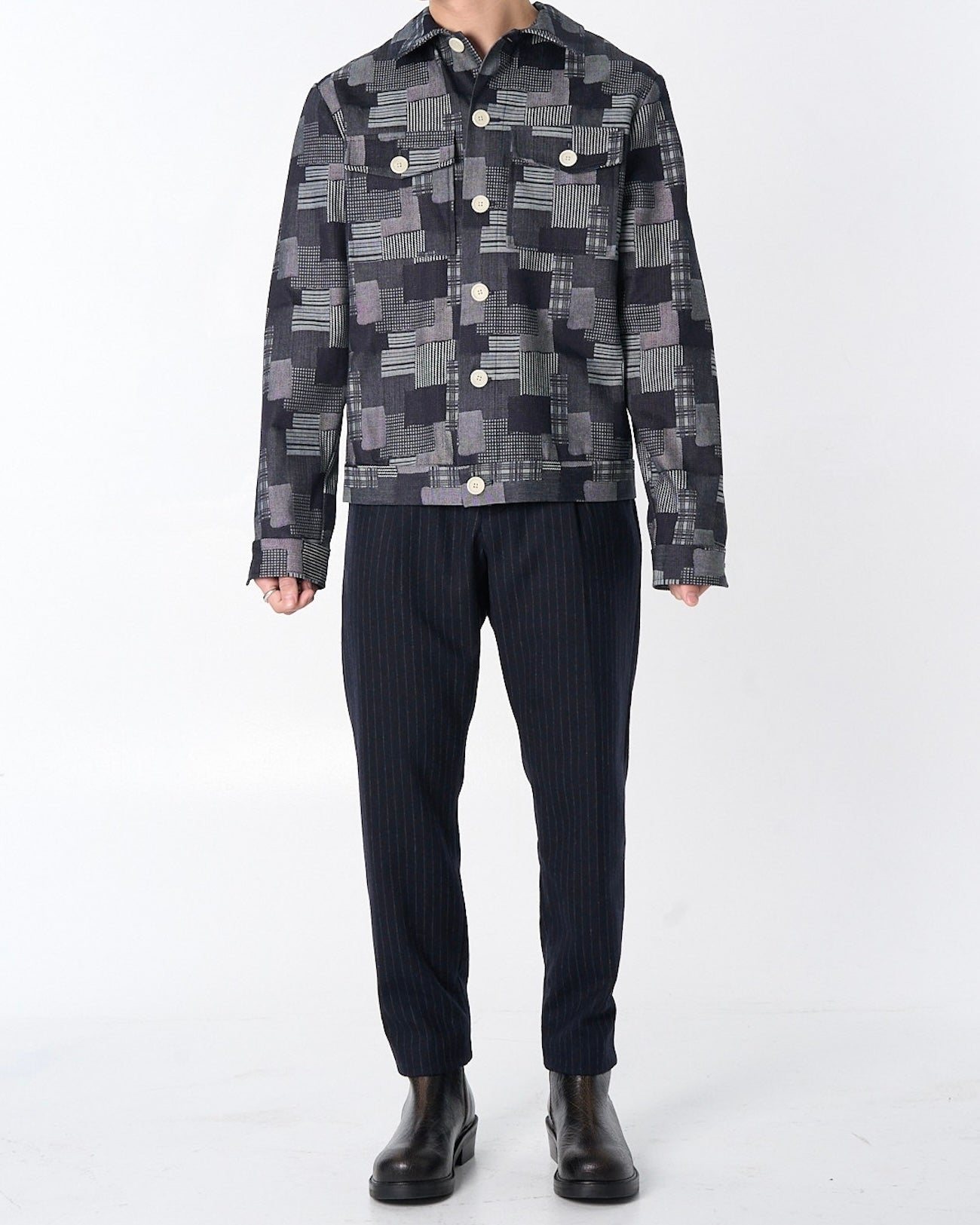 Dean Jacket in Dark Denim Patchwork Jacquard with relaxed boxy fit, shown on model displaying textured Japanese jacquard weave construction.
