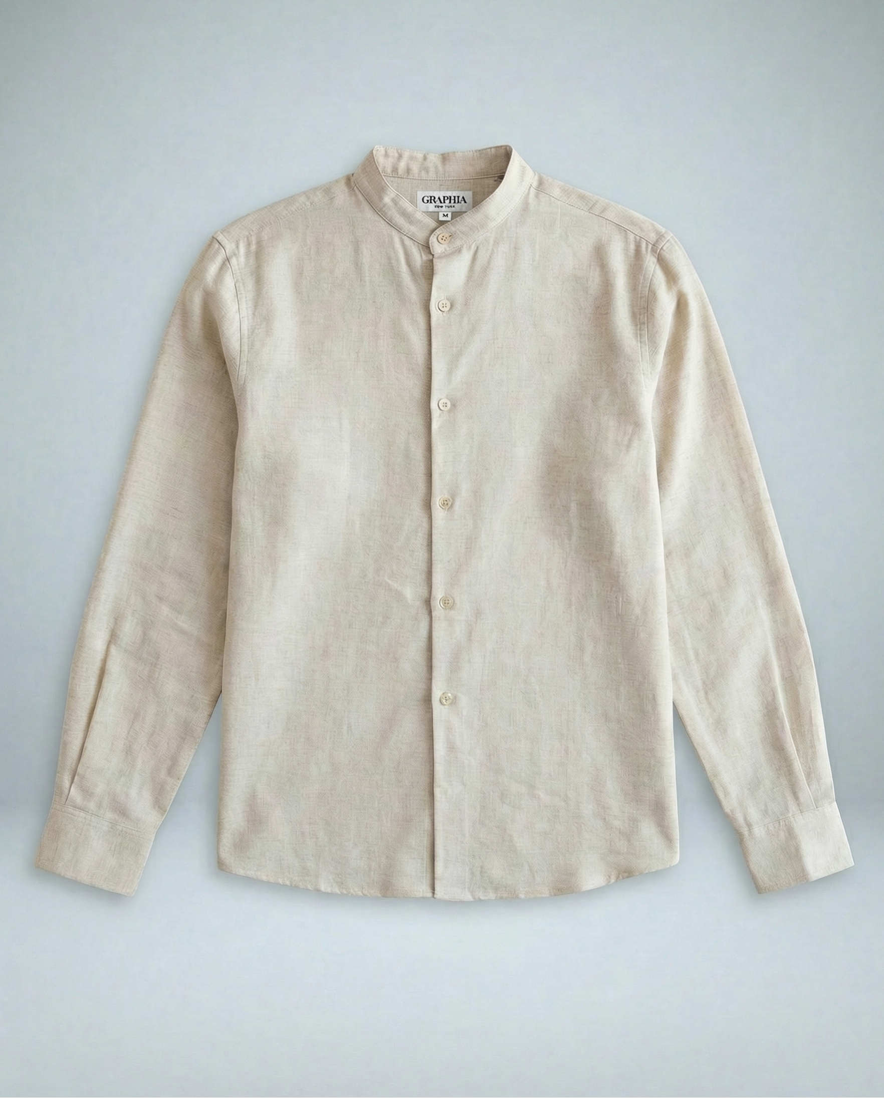 Liam band collar shirt in vintage cream linen cotton, relaxed fit, shown on model in three-quarter view